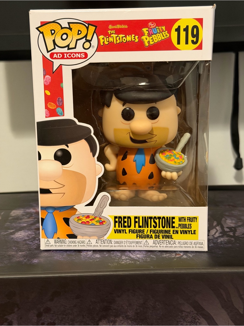 Funko Fred Flintstone with Fruity pebbles